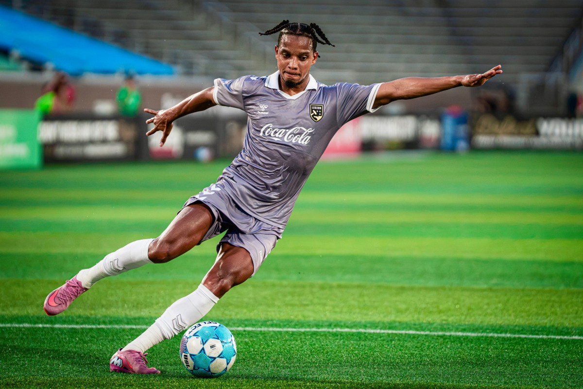 Birmingham Legion FC player winding up to strike the ball during a match
