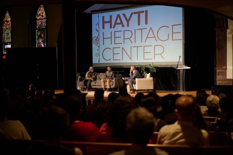Ajamu Dillahunt, Ajamu Dillahunt-Holloway, and Ta-Nehisi Coates at a sold-out August 19 event at the Hayti Heritage Center. Photo by Irene Hui.