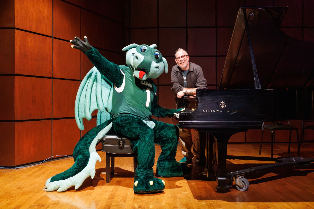 FREE music, vendors + family fun at the 2026 UAB Center for the Arts Block Party 7 University of Alabama at Birmingham's mascot Blaze the Dragon playing piano