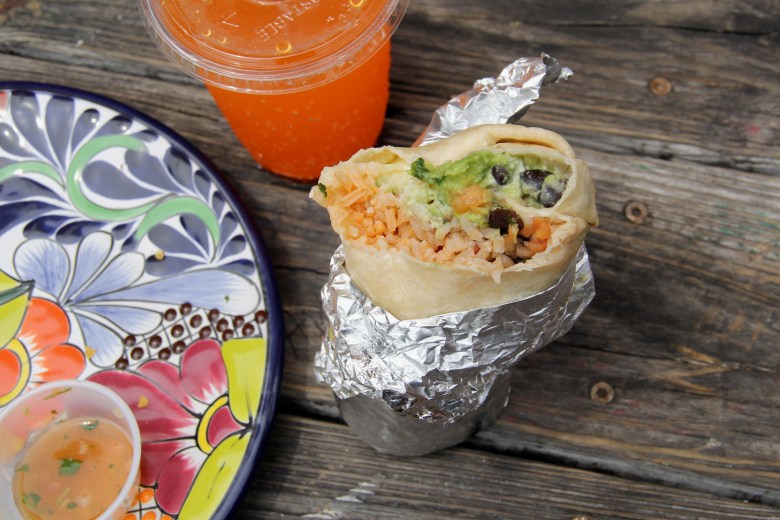 The deluxe veggie burrito at Cosmic Cantina. Photo by Lena Geller.