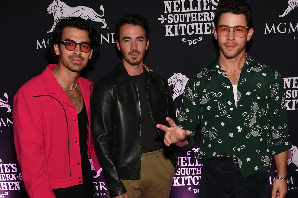 Joe Jonas, Kevin Jonas and Nick Jonas of the musical group Jonas Brothers arrive at the grand o ...