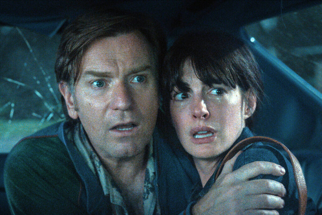 Ewan McGregor as Greg Platt and Anne Hathaway as Denise Platt in “The End of Oak Street.” ( ...