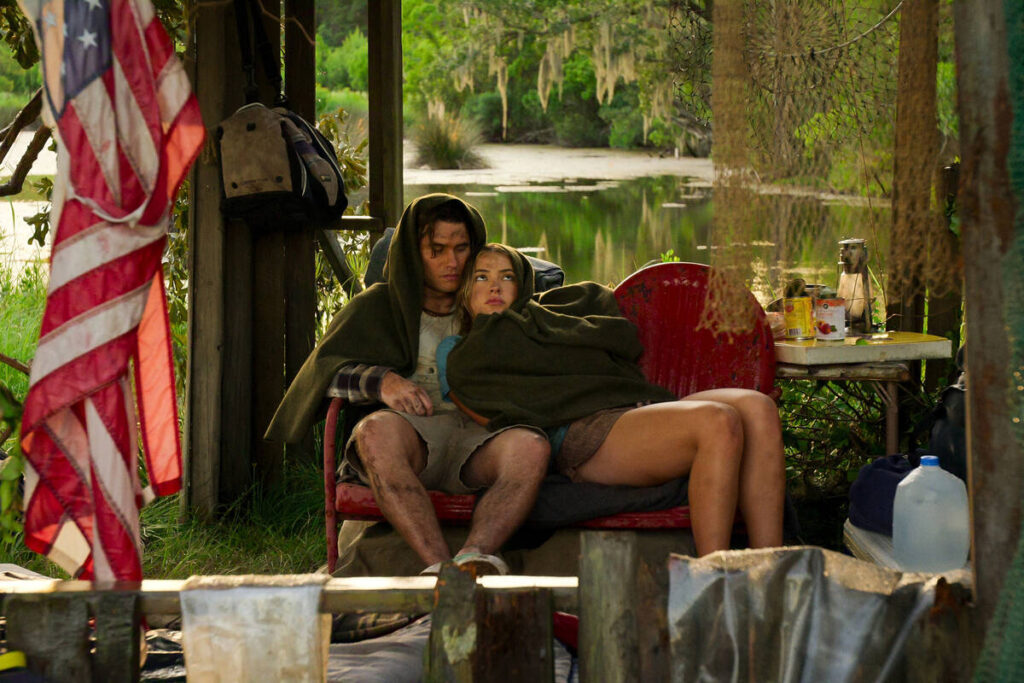 Chase Stokes as John B, Madelyn Cline as Sarah Cameron in "Outer Banks." (Netflix)