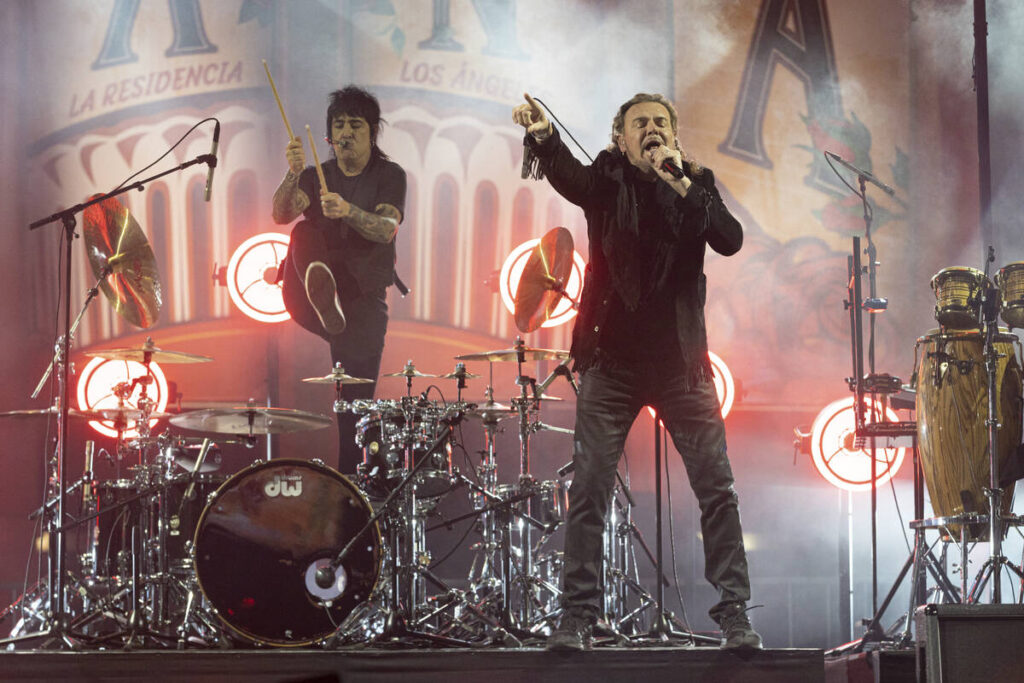 Alex Gonzalez, left, and Fher Olvera of the Mexican rock band Mana perform at the Los Angeles F ...