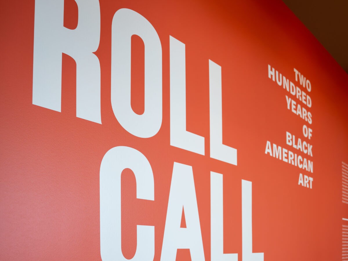 wall displaying "Roll Call"