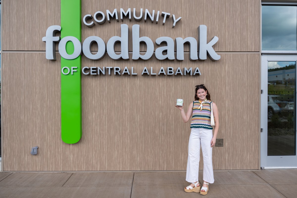 woman standing outside of the Community Foodbank of Central Alabama