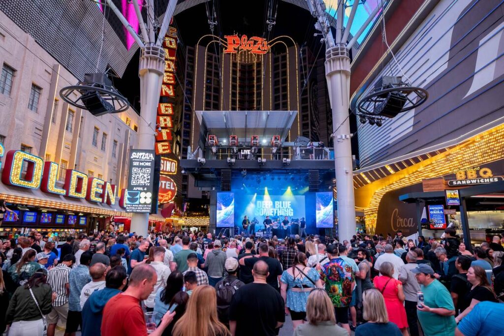 A shot of the frivolity at "90s House Party" at The Canopy at Fremont Street Experience on Satu ...