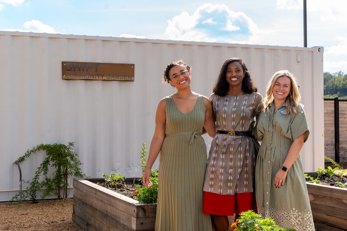 three women standing at the Shipt Community Garden at the Community Food Bank of Alabama