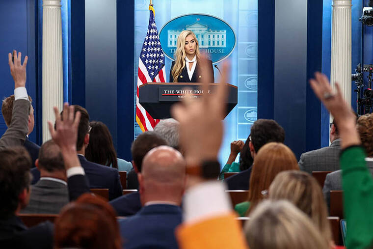 Katie Zacharia stepped to the lectern for the first time — it was a bumpy ride