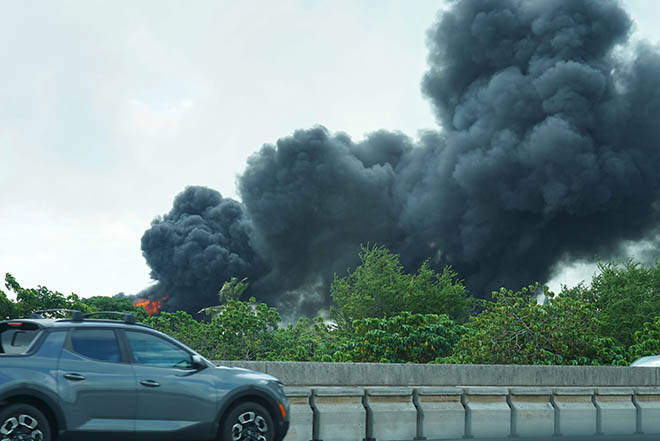 Pearl City junkyard fire sends heavy smoke throughout area